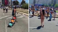 Festejos descontrolados: un hombre arrastrando un semáforo y una mujer desnuda en el Obelisco